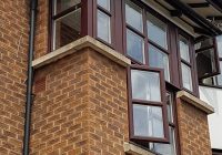 Casement windows shot from below the building