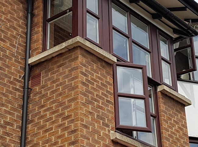 Casement windows shot from below the building