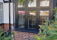 Black casement bow windows