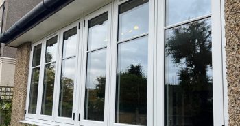 White casement window with a flush design