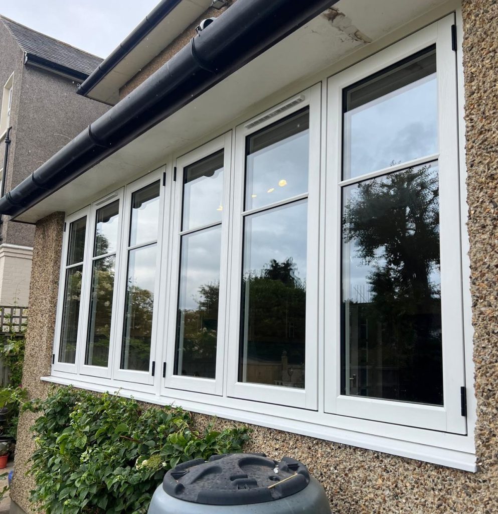 White casement window with a flush design